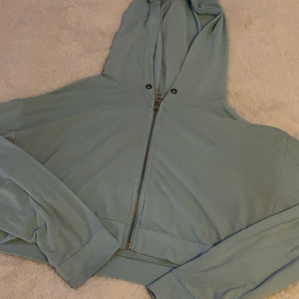 cropped light blue sweater